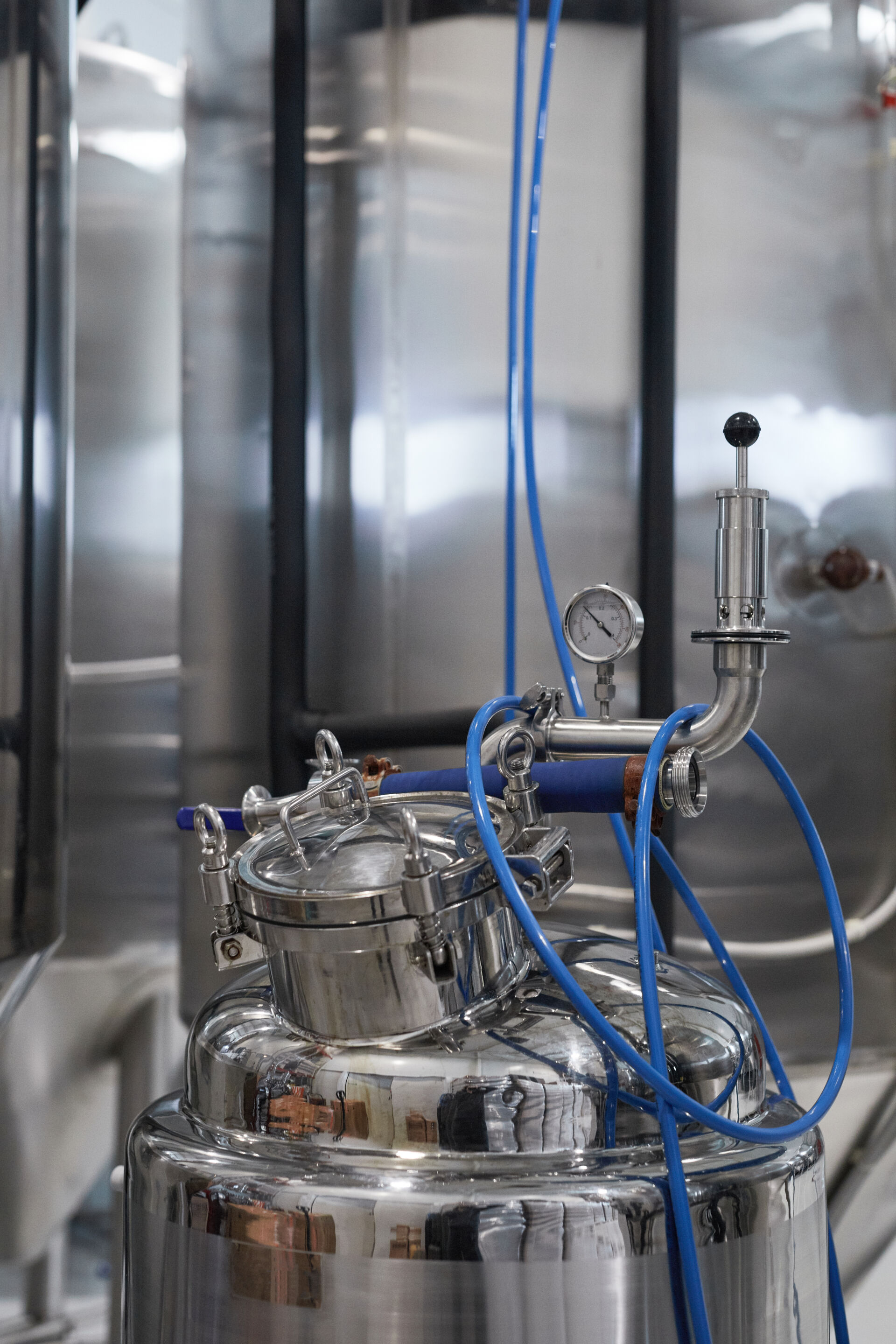 image of steel tanks and equipment in industrial workshop